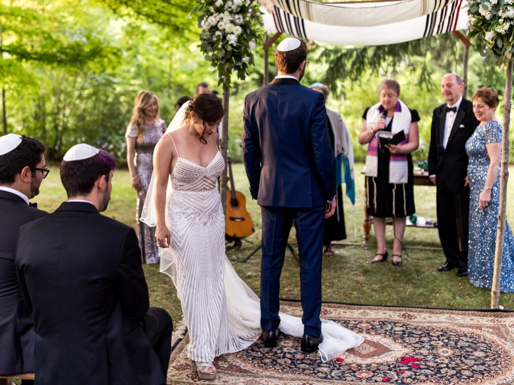 At the altar, the bride walks in a circle around the groom.